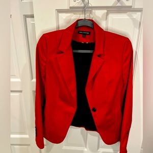 Red Express blazer, fitted style with single button.